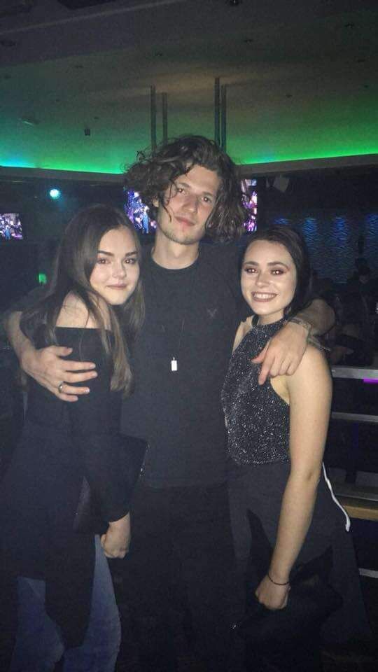 Image may contain: Night Life, Face, Clothing, Apparel, Party, Female, Night Club, Club, Human, Person