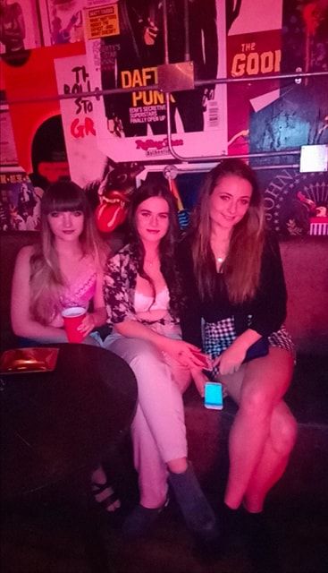 Image may contain: Woman, Face, Night Club, Female, Night Life, Club, Party, Apparel, Clothing, Human, Person