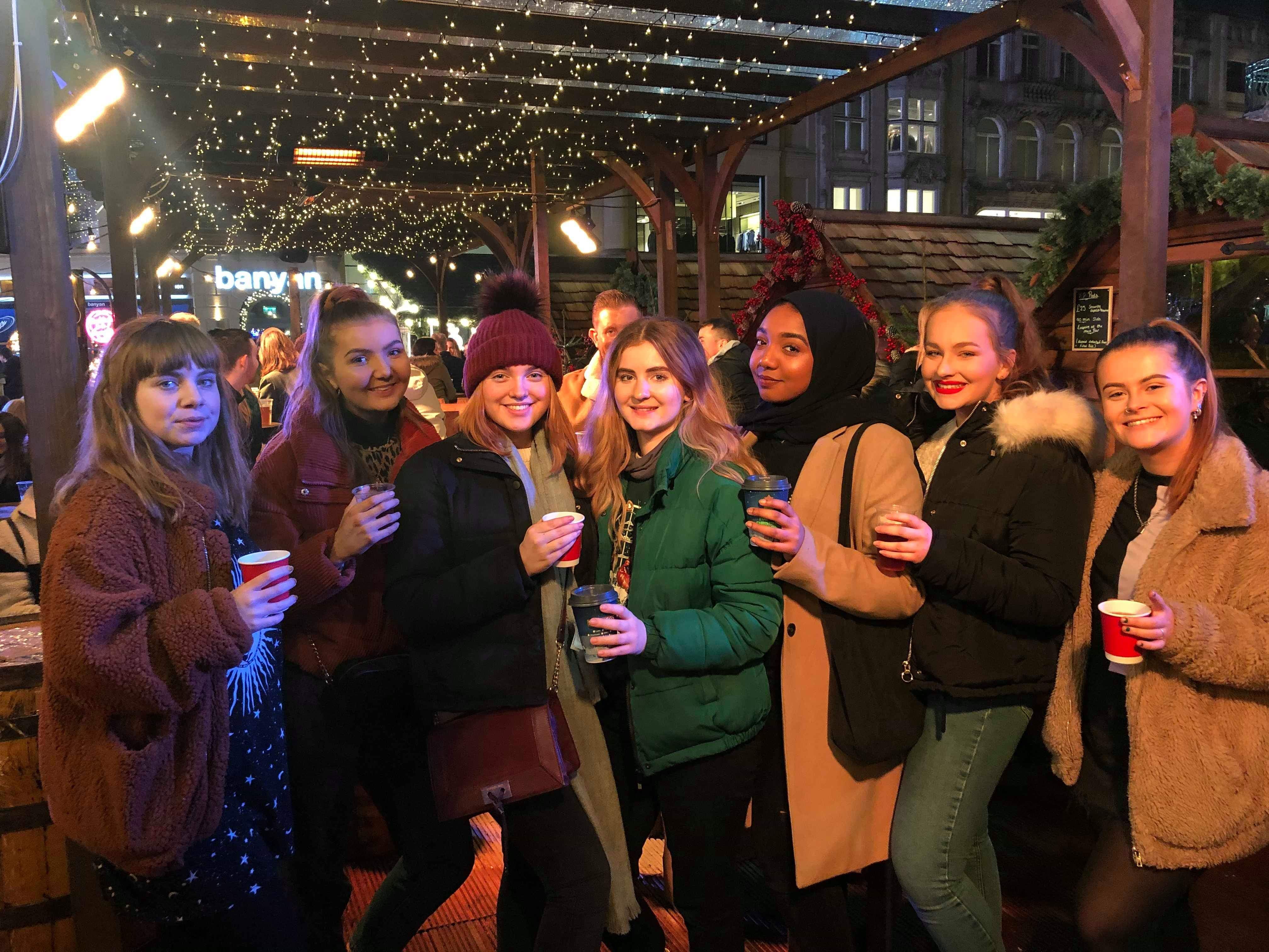 Image may contain: People, Indoors, Interior Design, Crowd, Apparel, Clothing, Night Life, Person, Human
