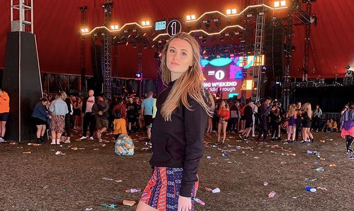 Image may contain: Lighting, Crowd, Skirt, Woman, Skin, Female, Person, Human, Apparel, Clothing