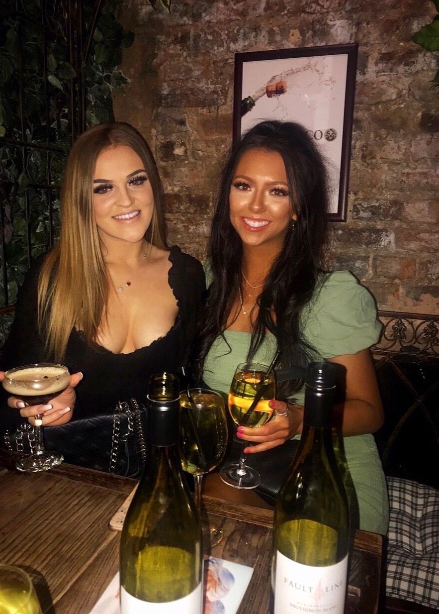 Image may contain: Stout, Bar Counter, Pub, Bottle, Alcohol, Drink, Beer, Beverage, Person, Human