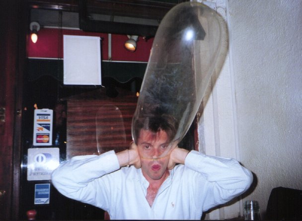 condom-being-inflated-over-mans-head