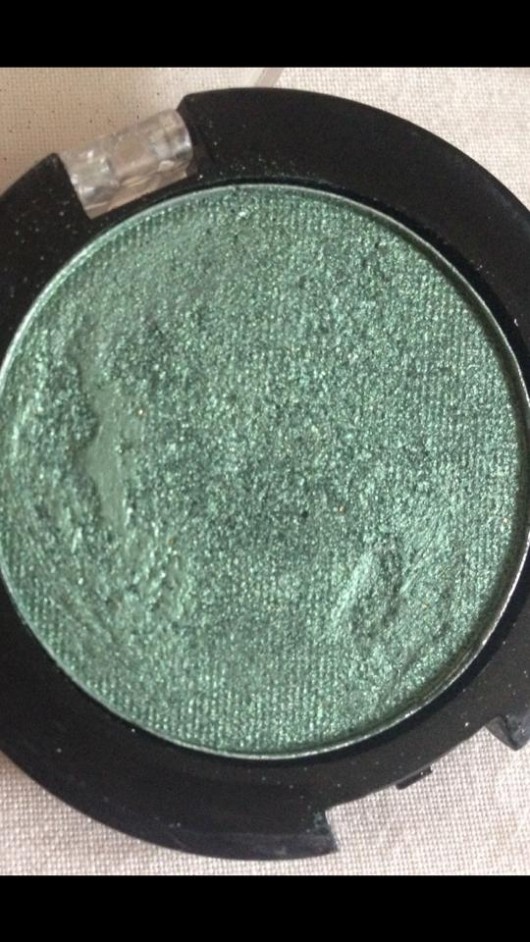 MUA pearl eyeshadow in shade 7- Christmas green- great for darker hair and to add a little festive colour to your Christmas day make-up look!