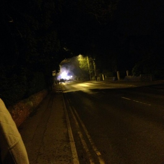 The students were moved to a safe distance and watch the taxi burst into flames