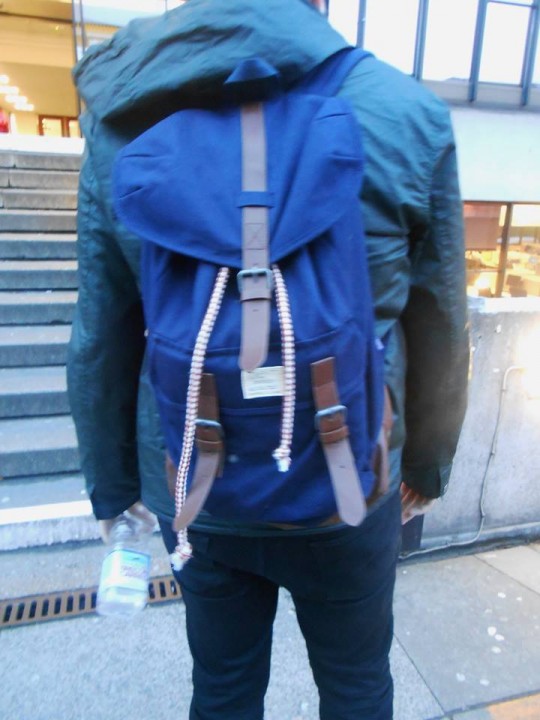 We love this navy H&M backpack which is a unique variation on the standard style with its duffle-like shape. Its detailing is really what makes it stand out, from the orange and white drawstring to the imitation leather on the buckles. This versatile bag can be bought in stores now for a bargain at £24.99!