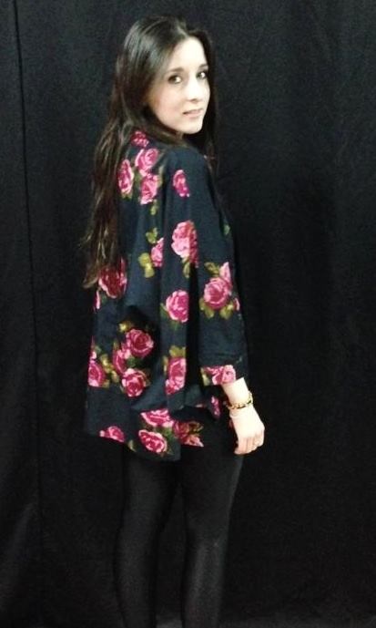 This kimono is made of a lovely silky material, and would be great with a plain top and jeans to add a little more colour and texture. Also great to wear on a night out!