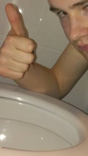 It's happened. The head-in-toilet 'nah I'm fine' selfie.