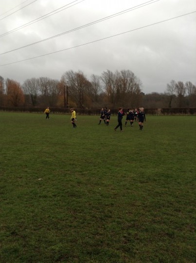 UEAWFC look happy with their win (and freezing...). 
