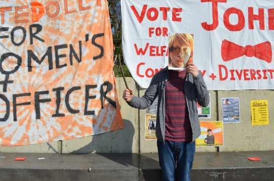 Ron takes his place amongst the banners.