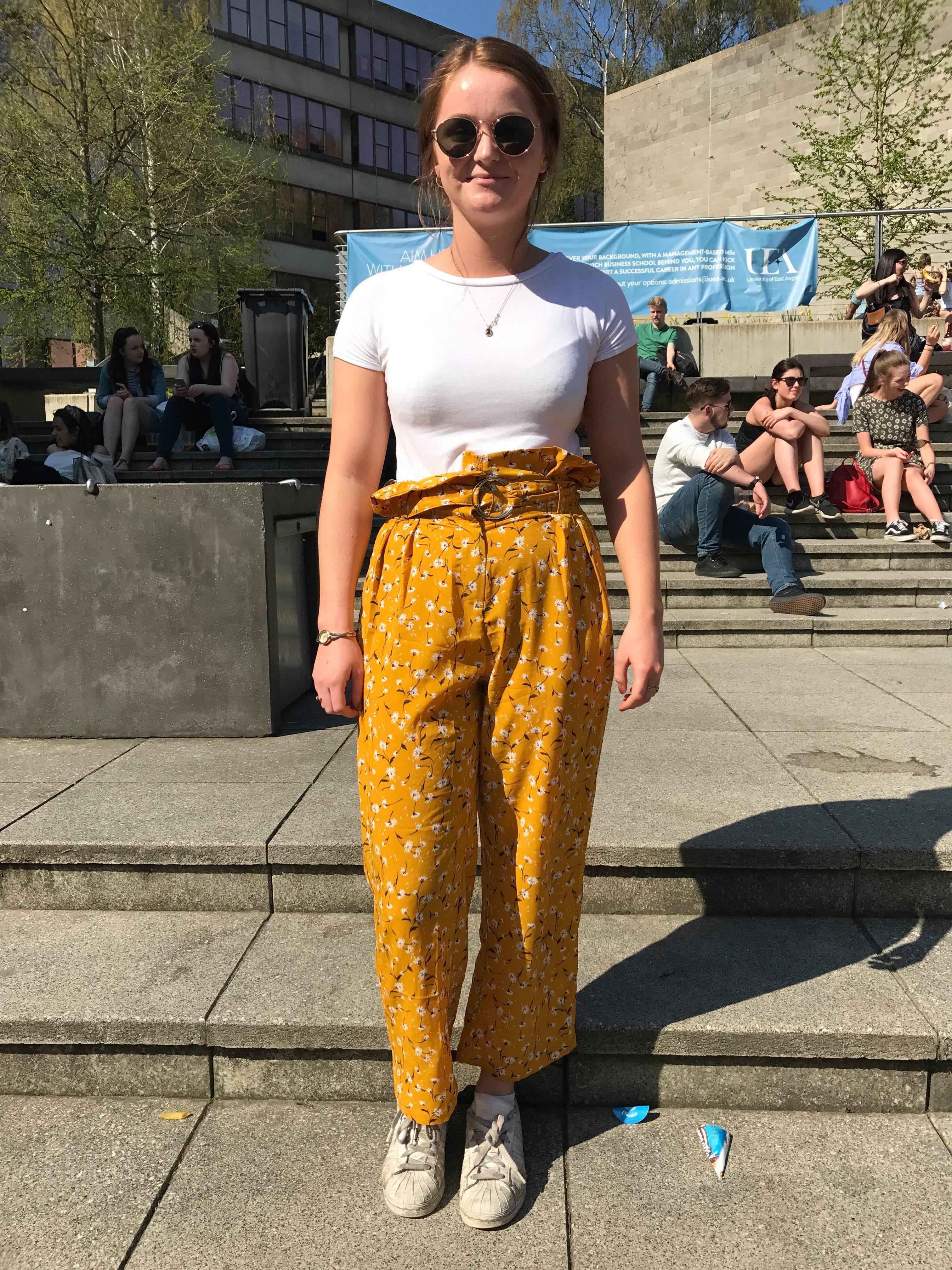Image may contain: Bench, Sari, Clothing, Person, People, Human