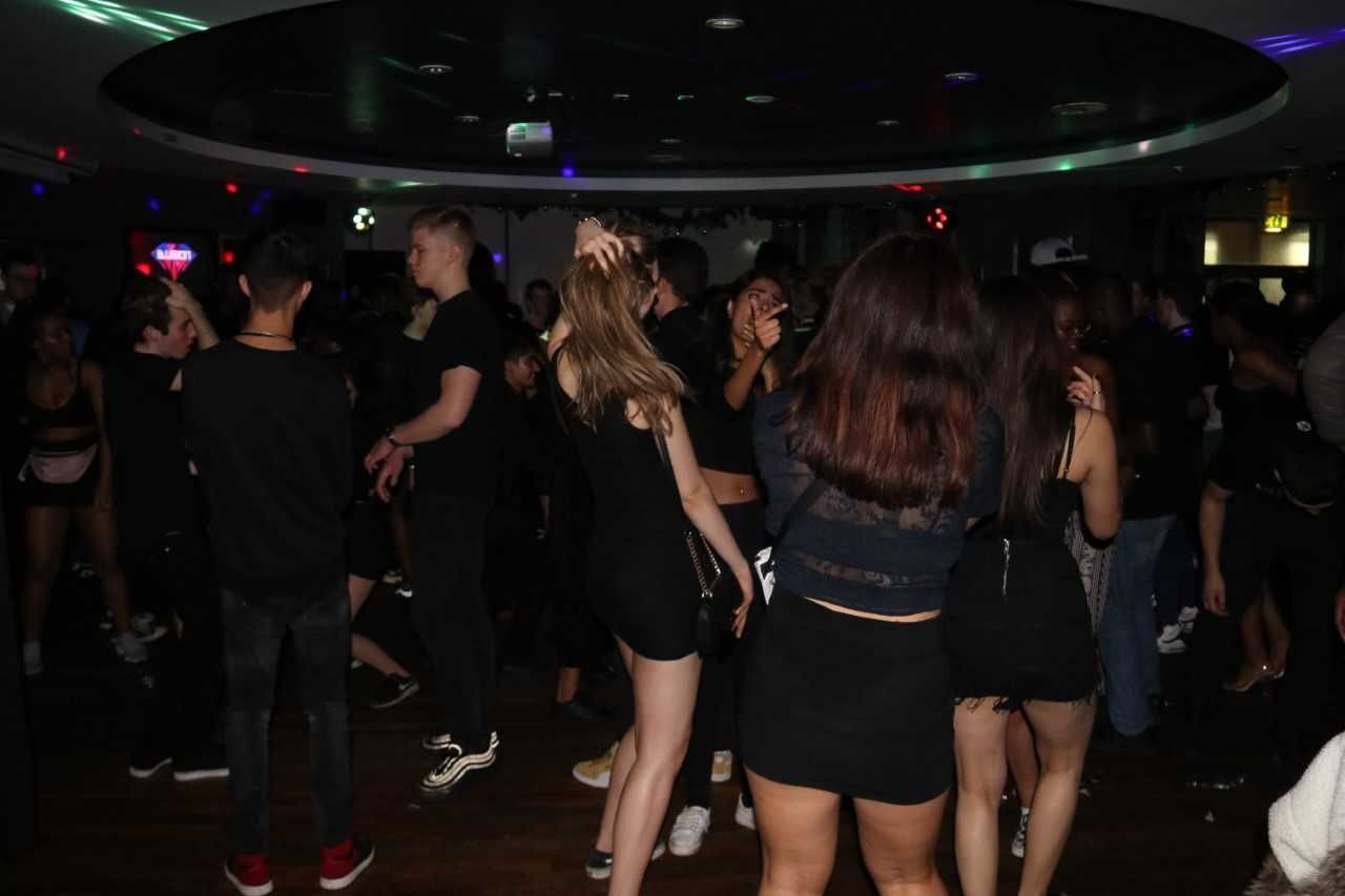 Image may contain: Disco, Night Club, Club, Shoe, Apparel, Footwear, Clothing, Human, Person