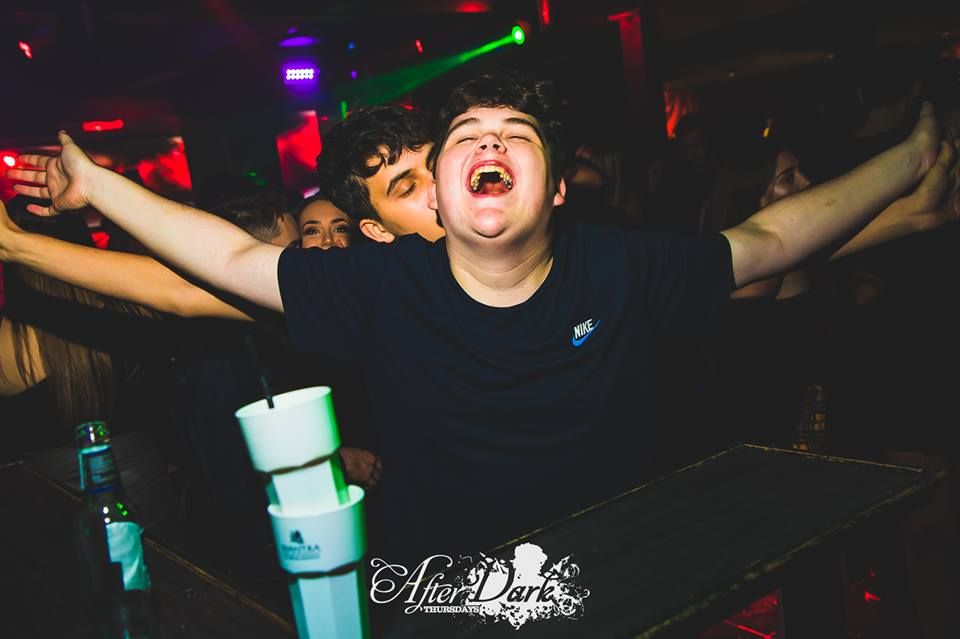 Image may contain: Night Life, Disco, Face, Party, Human, Person, Night Club, Club