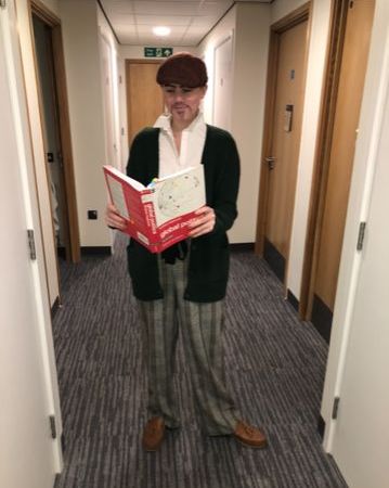 Image may contain: Flooring, Reading, Human, Person
