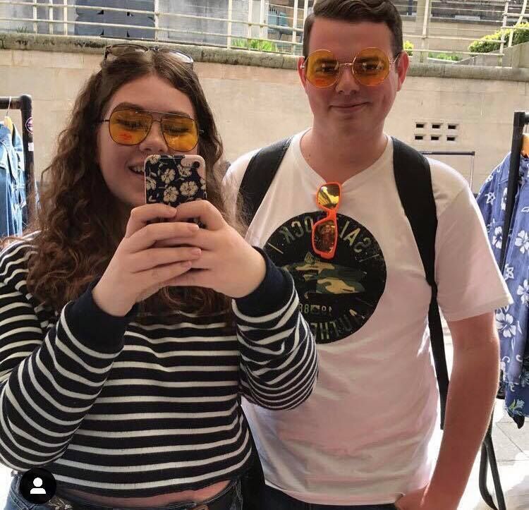 Image may contain: Smile, Man, Vacation, Female, Skin, Face, Glasses, Sunglasses, Accessory, Accessories, Clothing, Apparel, Human, Person