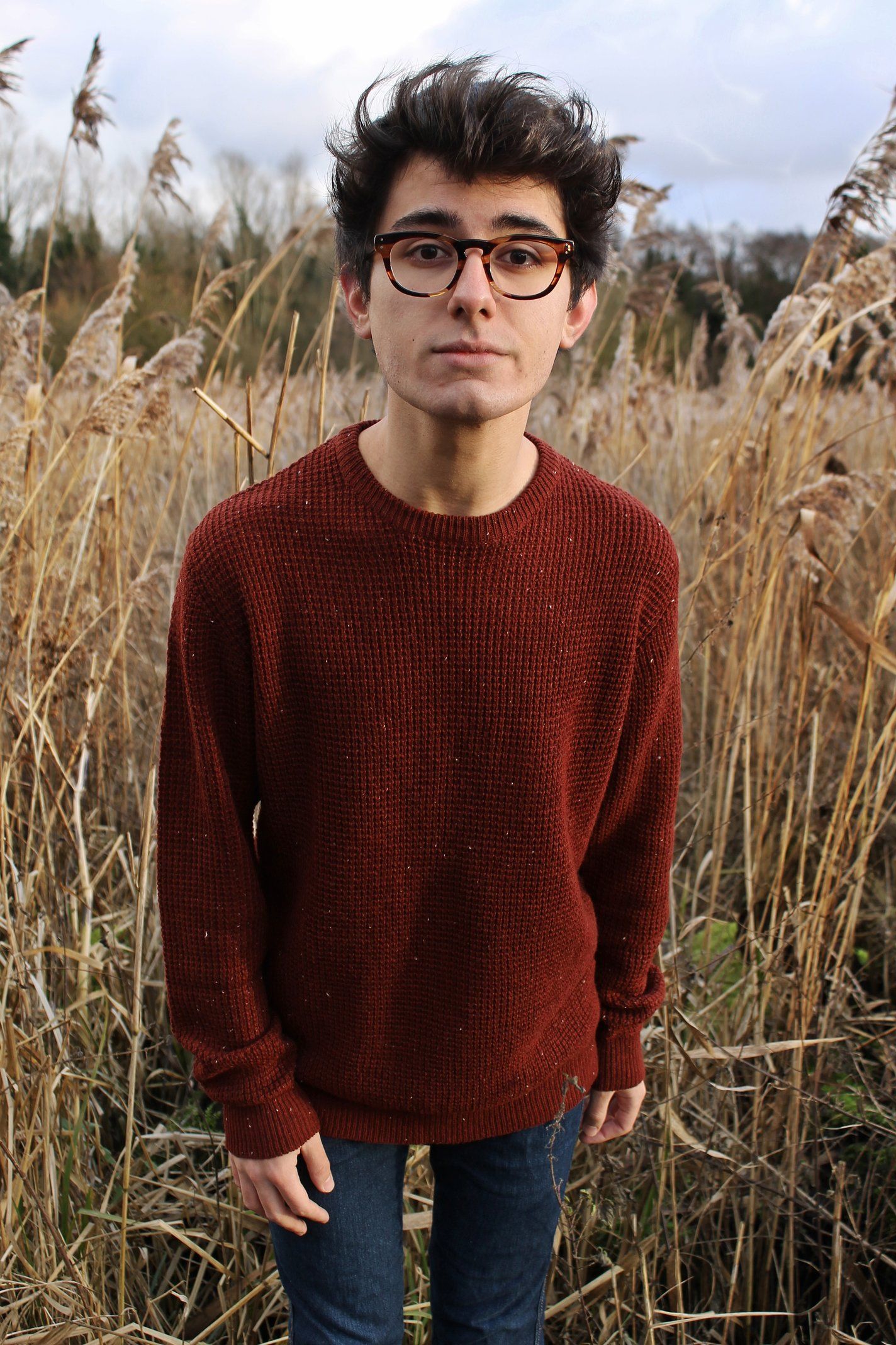 Image may contain: Vegetable, Food, Produce, Grain, Accessory, Glasses, Accessories, Grass, Plant, Human, Person, Sleeve, Sweater, Apparel, Clothing