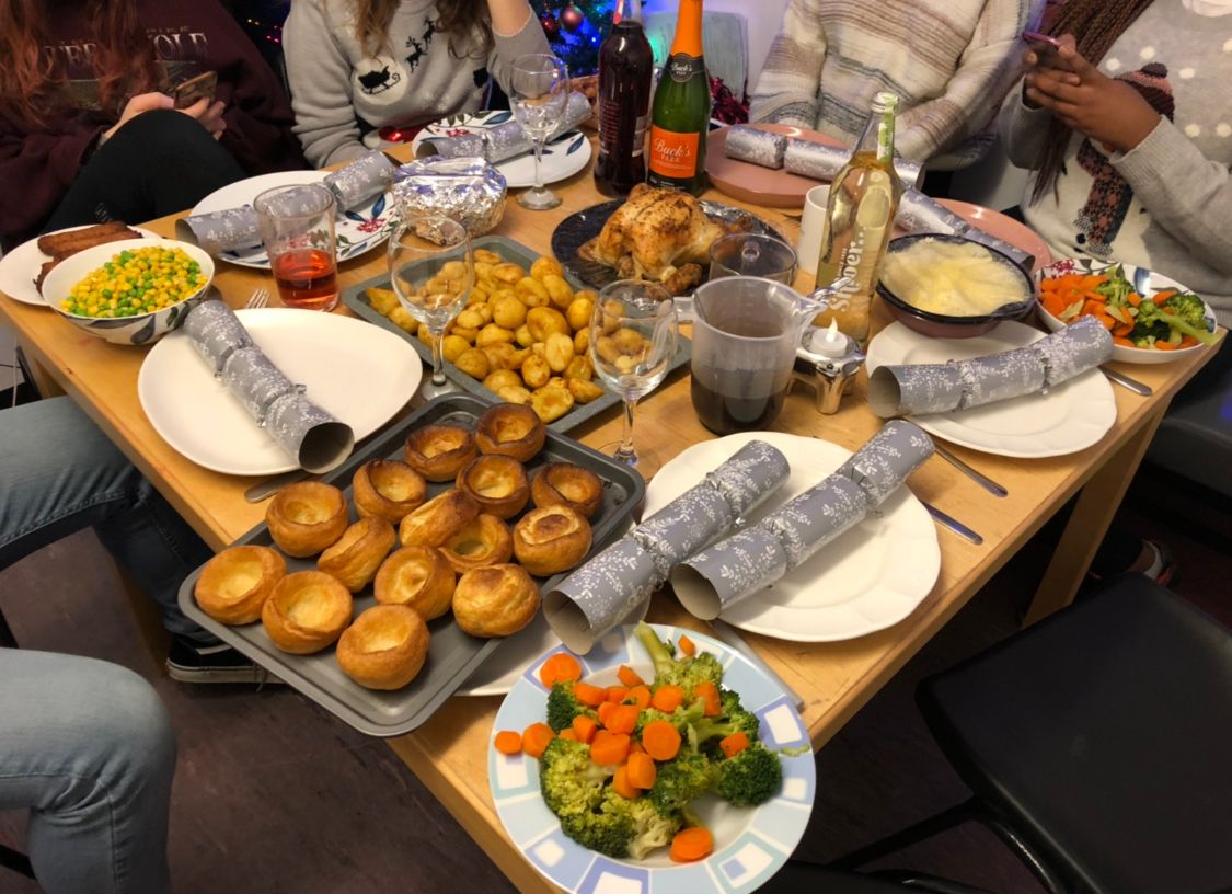 Image may contain: Supper, Dinner, Beer, Beverage, Alcohol, Drink, Buffet, Cafeteria, Dish, Table, Dining Table, Restaurant, Chair, Furniture, Food, Meal, Person, Human
