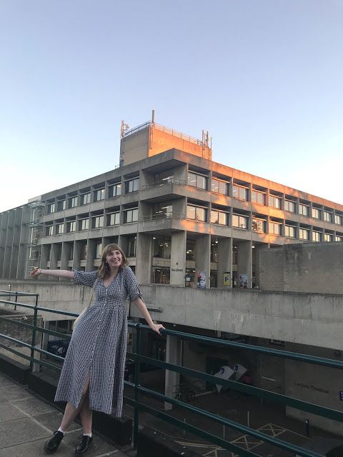 Image may contain: Housing, Banister, Handrail, Woman, Street, Road, Dress, Architecture, Female, Robe, Evening Dress, Gown, Fashion, Urban, City, Town, Metropolis, Building, Person, Human, Clothing, Apparel