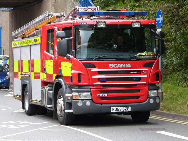 Fresh from dealing with a victim of Nando's Extra hot, A fire engine arrives at the scene