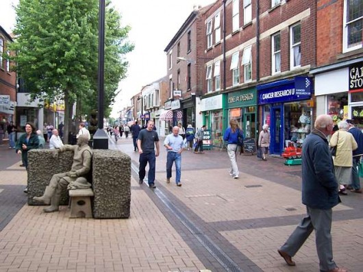 Home of many charity shops and creepy statues. 
