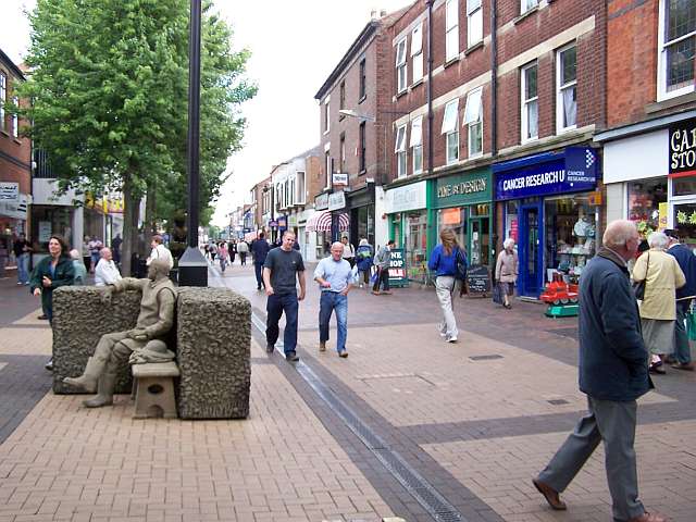 Home of many charity shops and creepy statues. 
