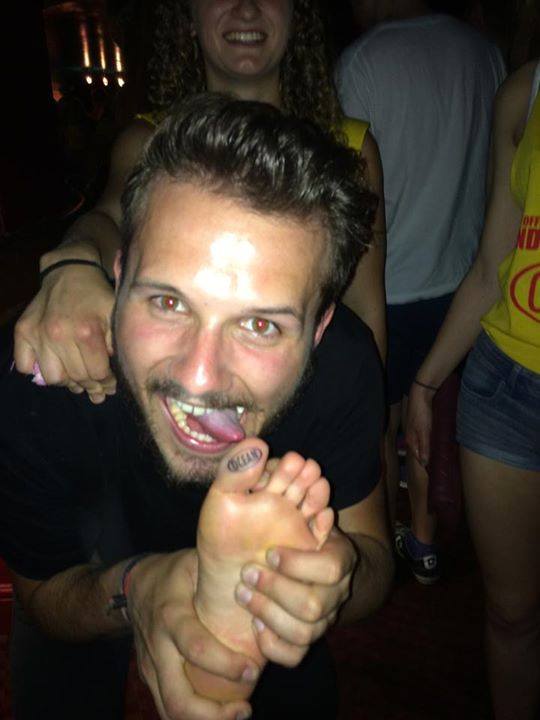 licking her toe