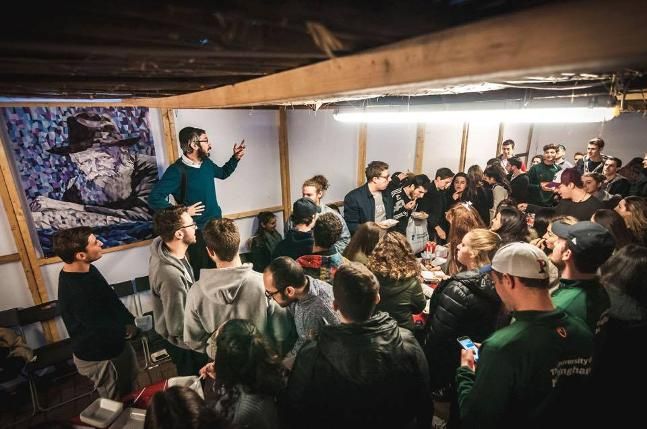 Image may contain: White Board, Crowd, Person, People, Human