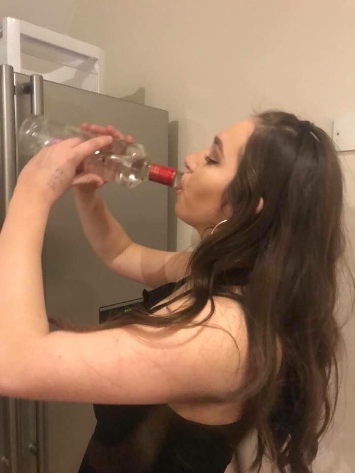 Image may contain: Bottle, Person, People, Human