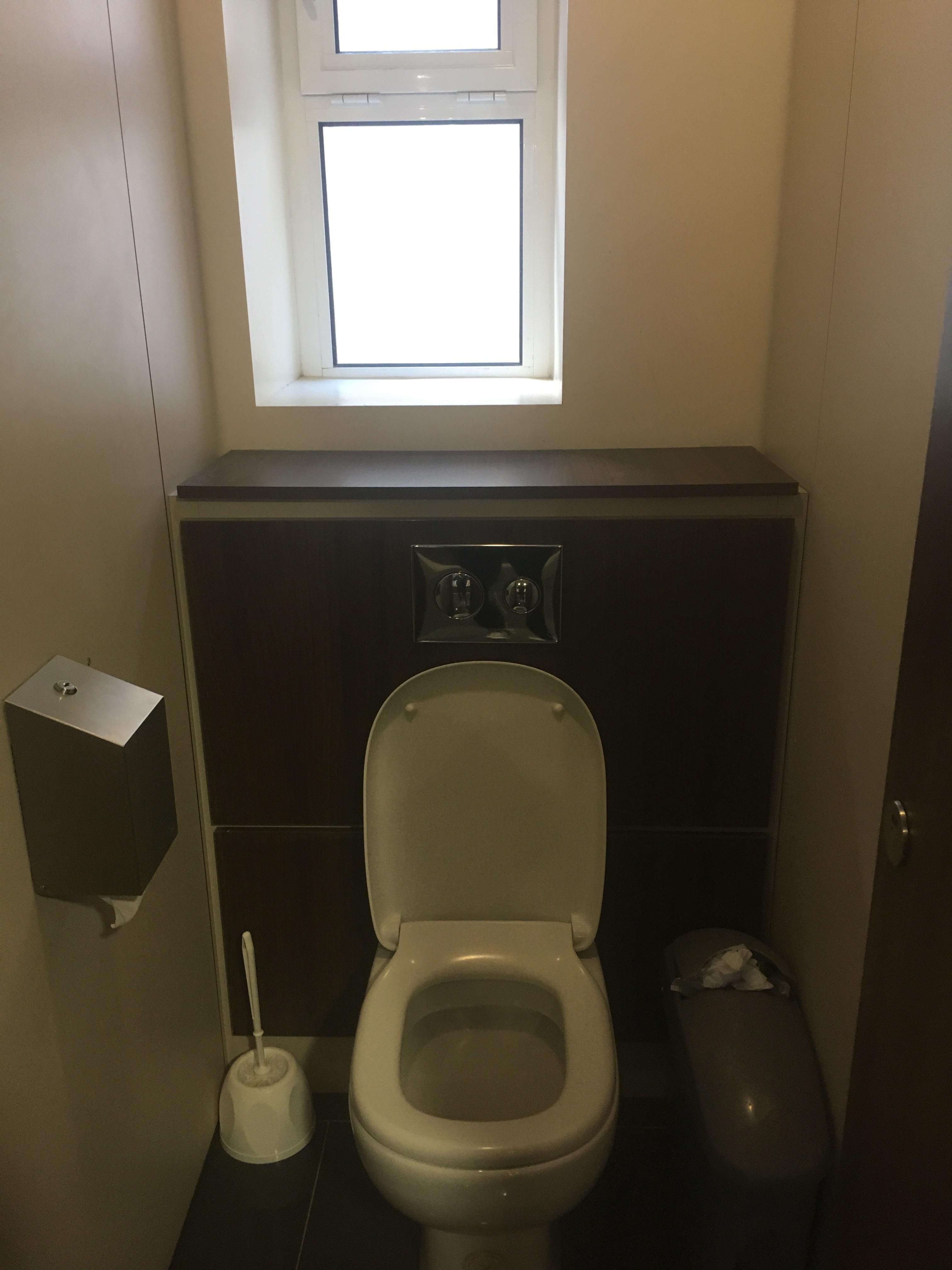 Image may contain: Box, Window, Skylight, Building, Architecture, Toilet