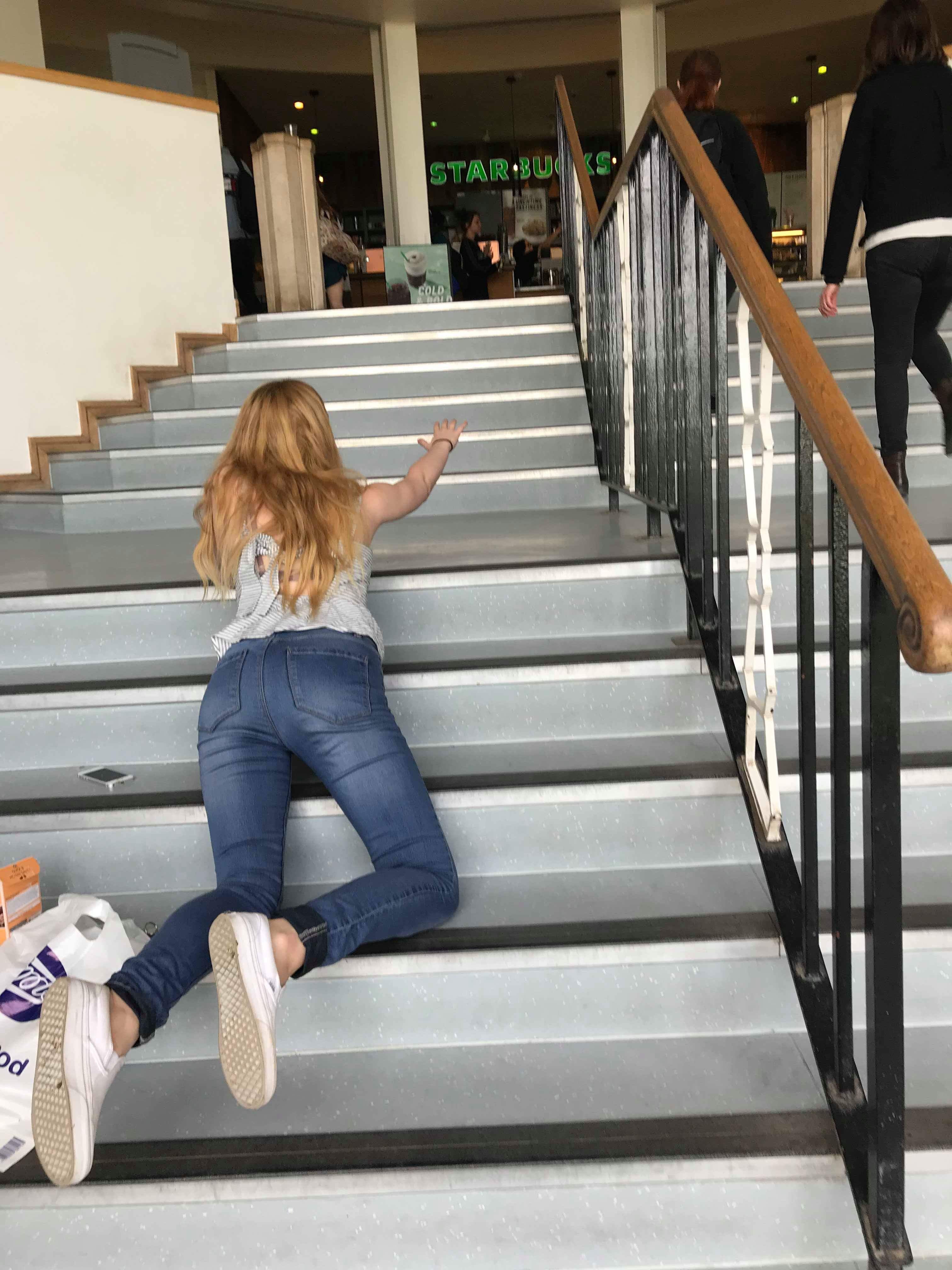 Image may contain: Leisure Activities, Woman, Girl, Female, Blonde, Handrail, Banister, Shoe, Footwear, Clothing, Person, People, Human