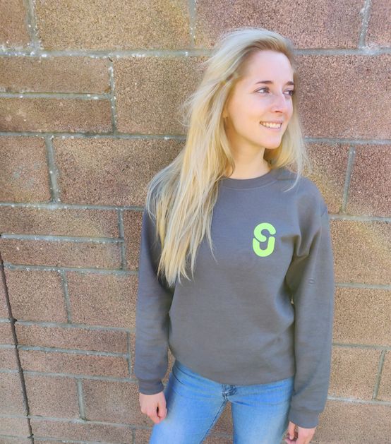 Image may contain: Brick, Sweater, Sweatshirt, Denim, Jeans, Pants, Blonde, Woman, Kid, Teen, Female, Person, Child, Girl, Human, Long Sleeve, Sleeve, Apparel, Clothing