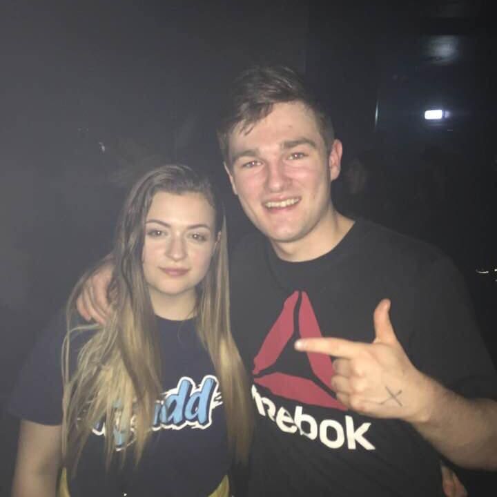 Image may contain: T-Shirt, Woman, Photo, Portrait, Photography, Girl, Club, Night Life, Female, Face, Clothing, Apparel, Human, Person