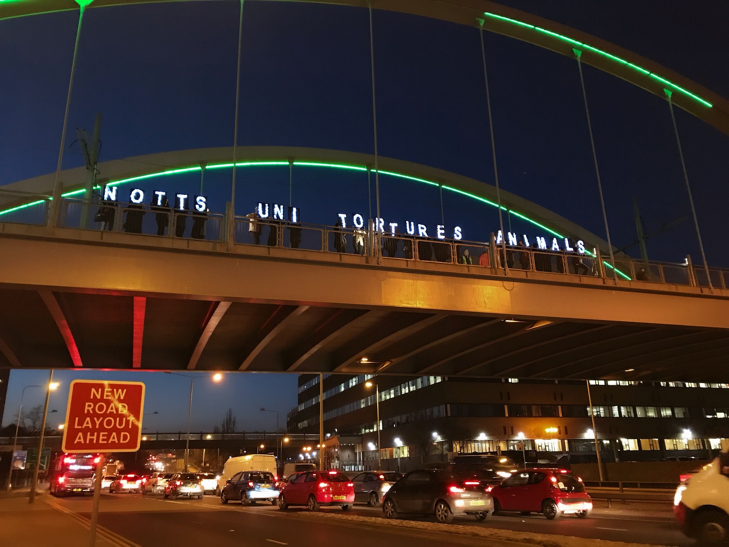 Image may contain: Human, Person, Building, City, Metropolis, Urban, Town, Boat, Overpass, Car, Vehicle, Automobile, Transportation, Freeway, Road
