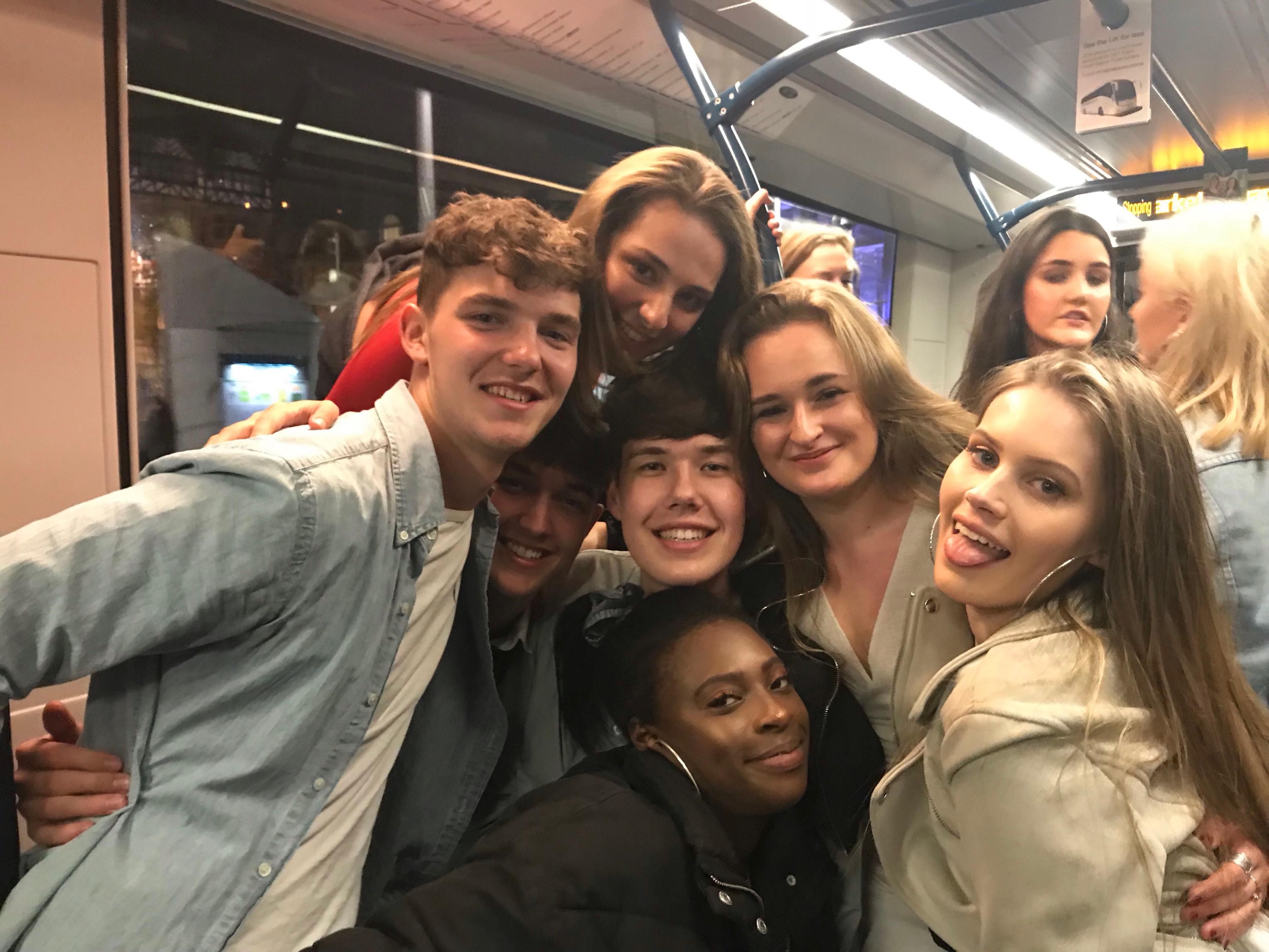 Image may contain: Smile, People, Coat, Night Life, Selfie, Photography, Photo, Portrait, Apparel, Clothing, Head, Face, Person, Human