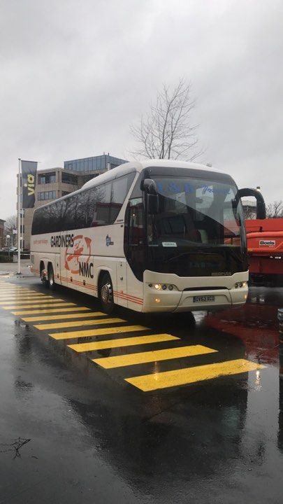 Image may contain: Zebra Crossing, Road, Asphalt, Tarmac, Vehicle, Transportation, Bus