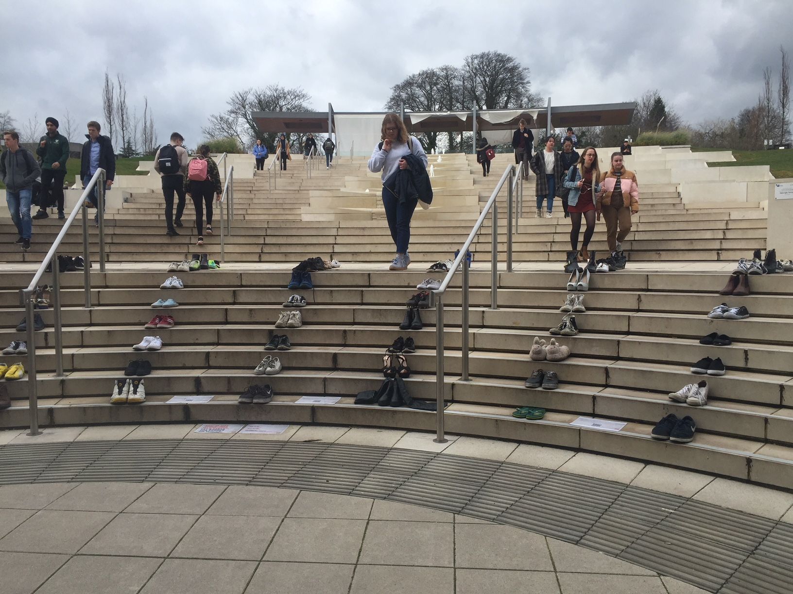 Image may contain: Railing, Building, Architecture, Staircase, Path, Animal, Bird, Pedestrian, Person, Human, Banister, Handrail