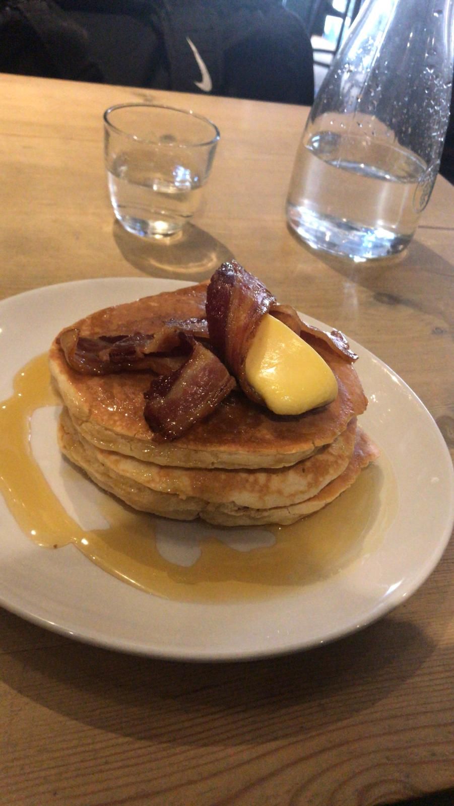 Image may contain: Table, Dining Table, Furniture, Burger, Pancake, Food, Bread