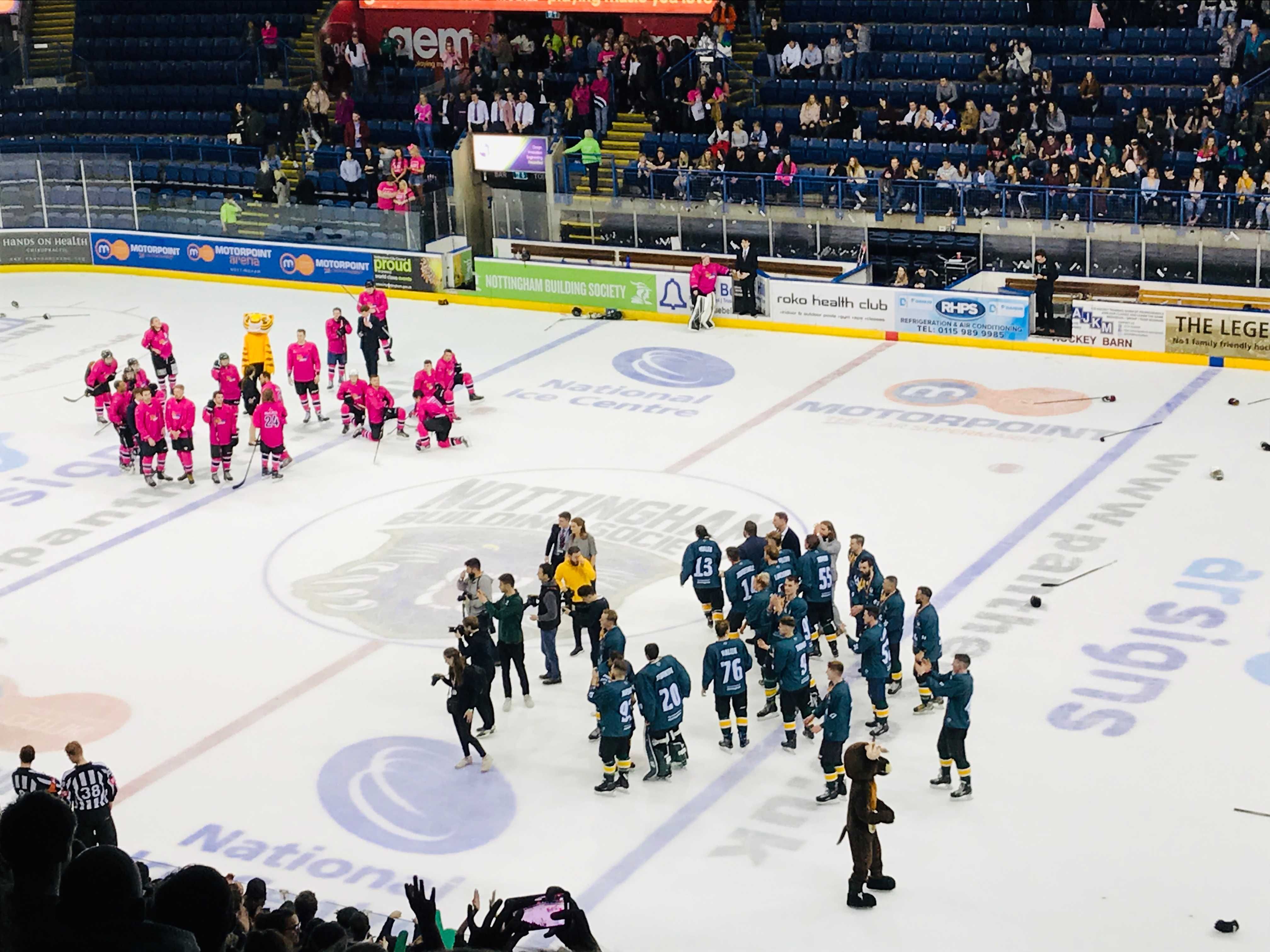 Image may contain: Building, Ice Hockey, Team, Team Sport, Hockey, Skating, Ice Skating, Rink, Sport, Sports, People, Human, Person