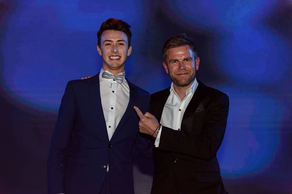 Image may contain: Face, People, Tuxedo, Tie, Accessories, Accessory, Blazer, Jacket, Performer, Clothing, Overcoat, Apparel, Coat, Suit, Person, Human