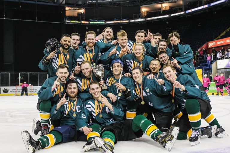 Image may contain: Ice Hockey, Skating, Ice Skating, Rink, Team Sport, Team, Hockey, Sports, Sport, Apparel, Clothing, Helmet, People, Person, Human