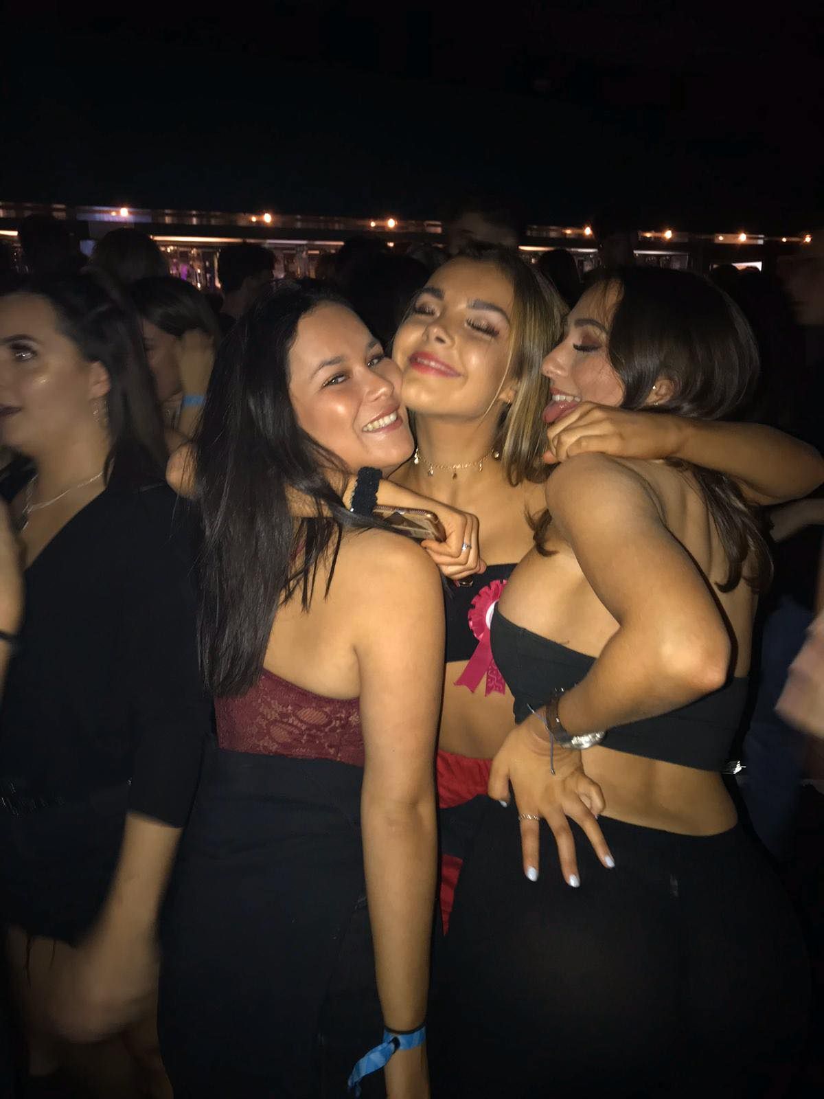 Image may contain: Back, Skin, Party, Night Club, Club, Human, Person, Night Life