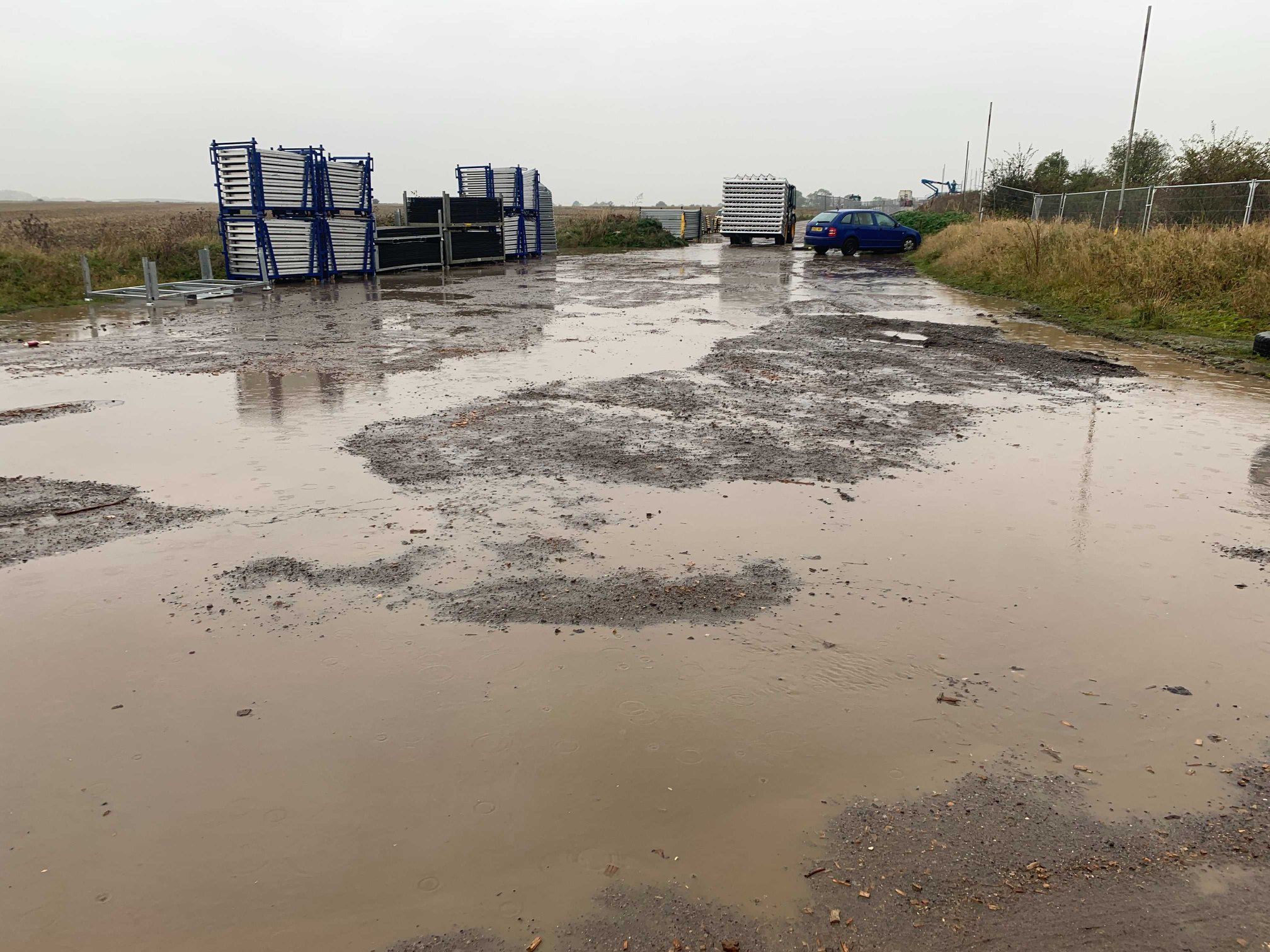 Image may contain: Outdoors, Ditch, Puddle, Car, Automobile, Transportation, Vehicle, Flood, Nature