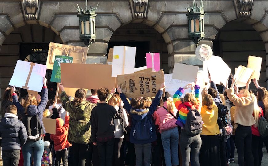 Image may contain: People, Text, Crowd, Protest, Parade, Human, Person