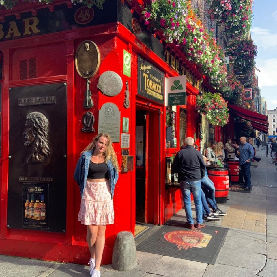 Image may contain: Denim, Pants, Jeans, Walkway, Path, Woman, Footwear, Shoe, Skirt, Pedestrian, Building, Road, Street, Urban, Town, City, Female, Clothing, Apparel, Person, Human