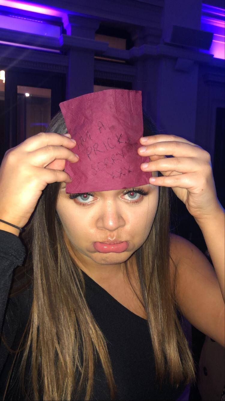Image may contain: Party Hat, Hat, Person, Human, Apparel, Clothing
