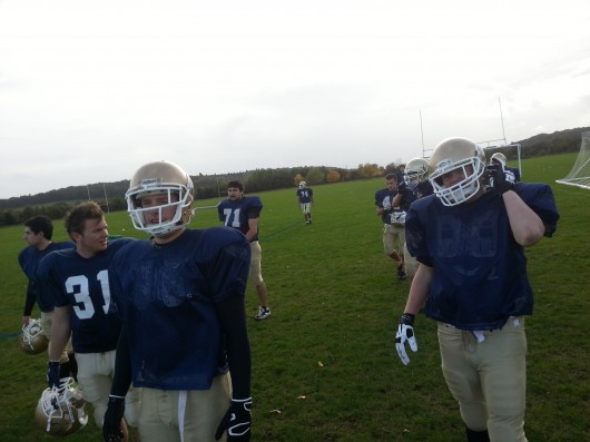 Club president Elliot Neale (centre) leads his men to war.