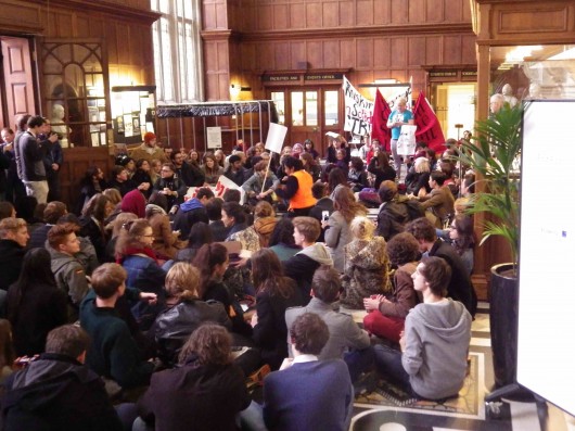 Akehurst (in orange) addressing the crowd