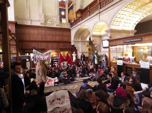 A student addresses the crowd