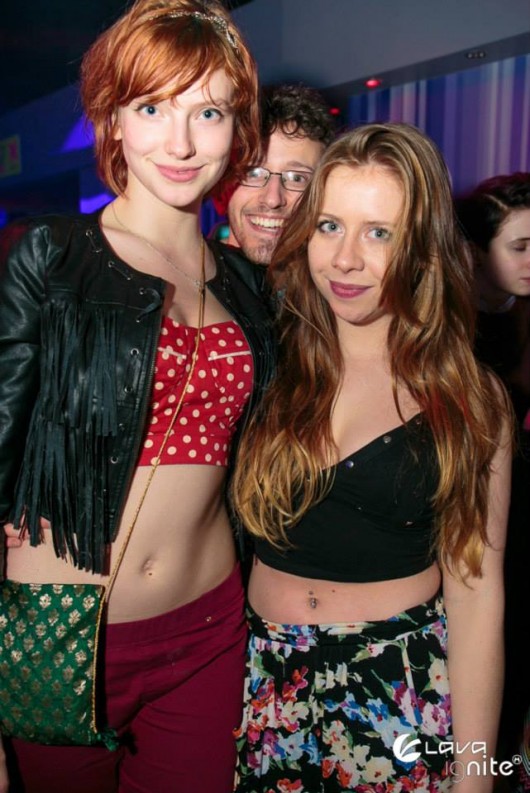 These two girls bring a boho edge to the dancefloor. The girl on the left looks great in this rockabilly style crop-top and leather jacket combination. And we love the studded top and vampy lipstick of the girl on the right.