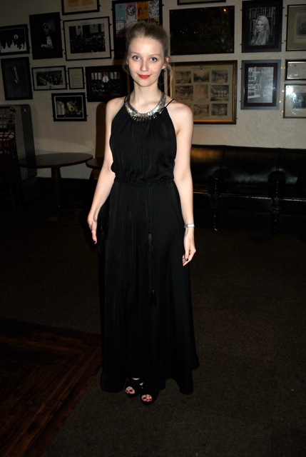 This girl played it simple and chic. Her gold accessories dress up her elegant black dress, while the red lips and pulled back bun scream classic but poised.