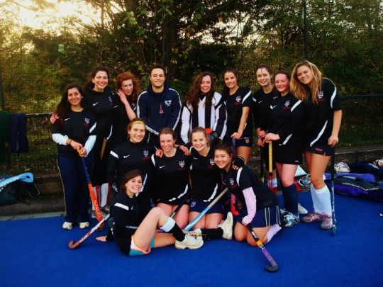 Millie (centre) with the Magdalen girls hockey team